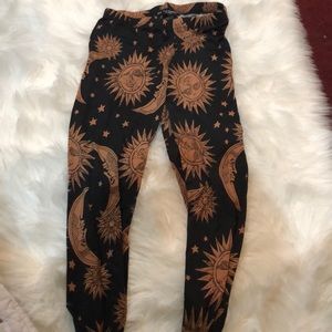 Moon and sun leggings.  Size medium.